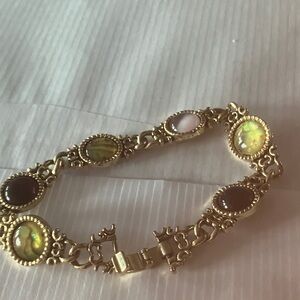 Elegant Gold-Tone Bracelet with Multi-Colored Stones